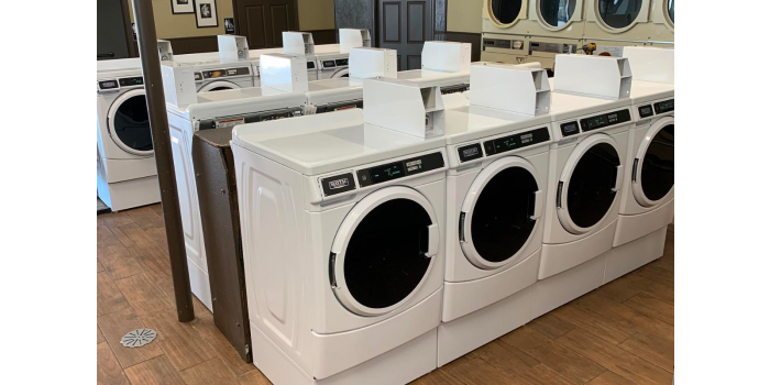 Laundromat Business Models: Unattended vs. Attended Laundromats Header Image